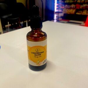 Lightening body oil